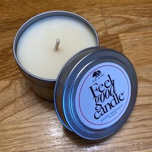 NWOT Origins candle in a tin - ginger, bergamot, clove